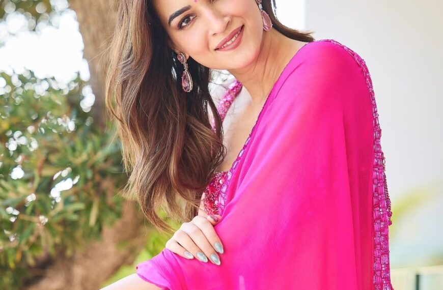 Kriti Sanon’s magenta pink Manish Malhotra sari and embellished bralette is a nod to 1940s fashion