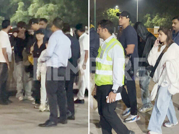 WATCH: Shah Rukh Khan hides his new look as he returns from Jamnagar