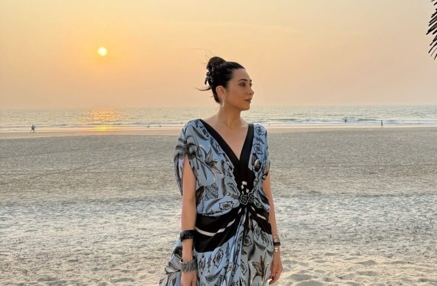 Karisma Kapoor serves bohemian beachwear inspiration in a printed hand-draped kaftan dress