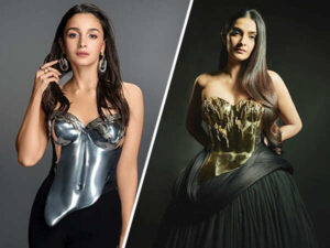 Fashion Face-Off: Who styled the metal breastplate better?