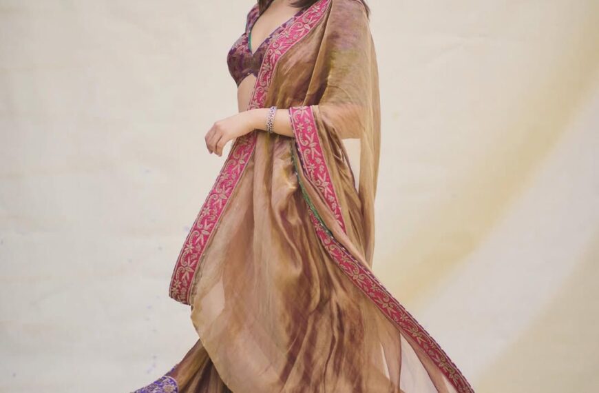 Navya Nanda’s gold tissue lehenga is paired with a vibrant vintage blouse with heritage crafts
