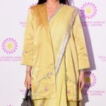 Karisma Kapoor builds her butter-yellow Anavila sari into a layered set