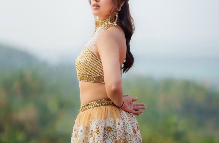 Bhumi Pednekkar pairs crochet-like florals with a metallic halter blouse