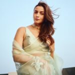 Alia Bhatt proves less is more for summer celebrations in a pistachio sari