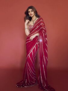 Sreeleela’s ruby red georgette sari is cut through&hellip;