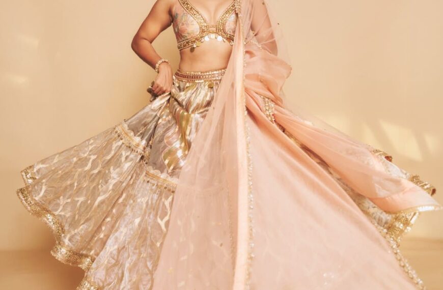 Wamiqa Gabbi’s Banarasi lehenga features cowrie shell and oversized sequins