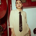 Karisma Kapoor elevated a simple shirt dress with a tie