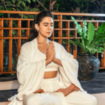 Supta baddha konasana is the yoga pose that may help you feel less bloated after meals