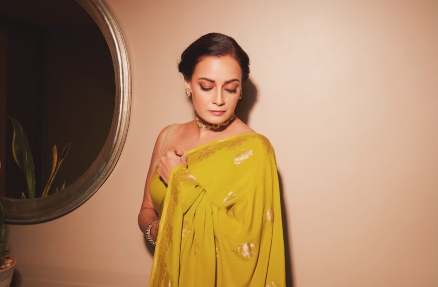 Dia Mirza’s chartreuse sari from Shanti Banaras features vintage floral motifs hand-woven in silver zari