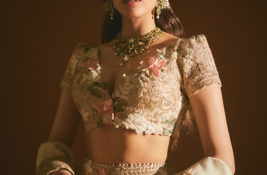 Janhvi Kapoor’s Anamika Khanna lehenga for Anshula Kapoor’s wedding ceremony was detailed with pink and green floral appliqué