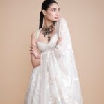 The neckline on Athiya Shetty’s Rohit Bal anarkali features the house’s signature thread and pearl embroidery