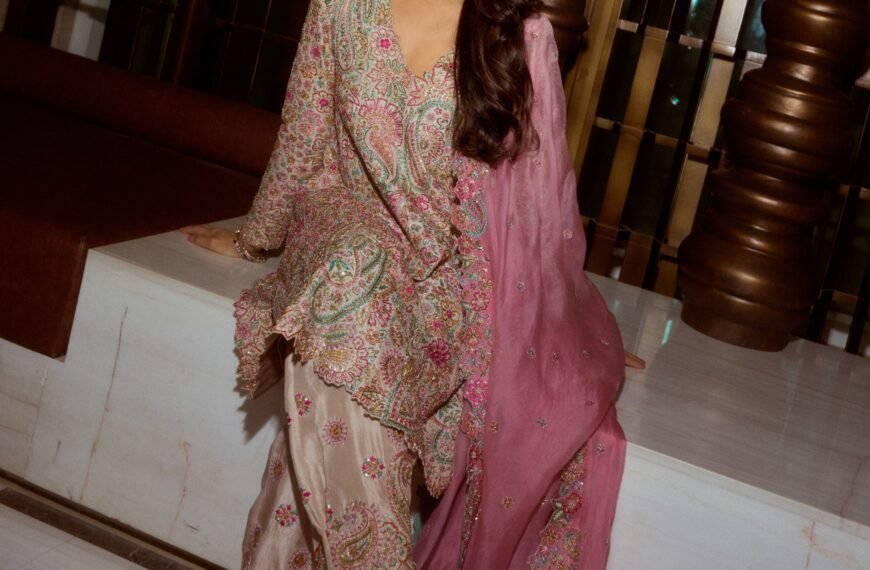 Karisma Kapoor’s silk kurta is embroidered with colourful resham threads and intricate zardozi