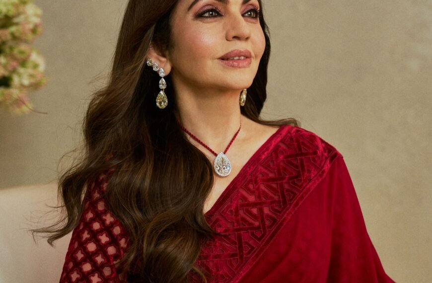 Nita Ambani wore a maroon Abu Jani Sandeep Khosla sari with an Art Deco-inspired geometric border